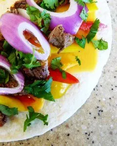 photo of a steak quesadilla before cooking