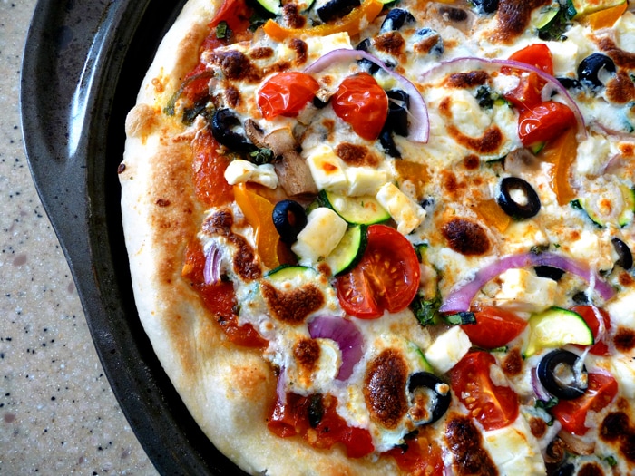 supreme vegetarian pizza with mozzarella and feta