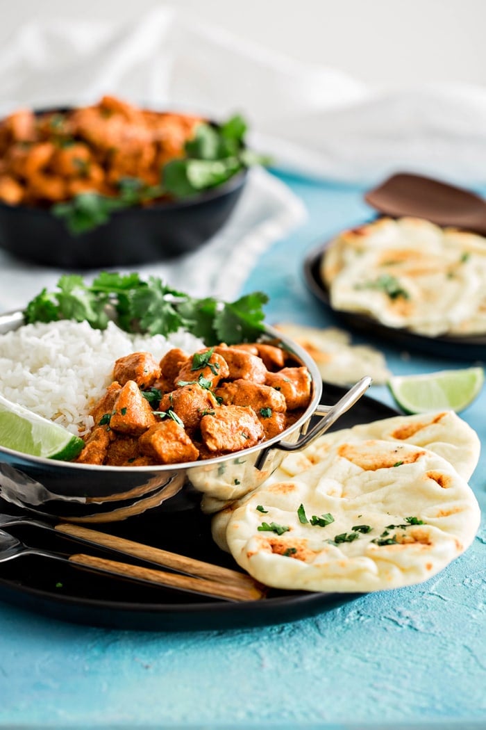 Indian Butter Chicken with Basmati Rice is a delicious, easy Indian recipe.  This family favorite makes it simple to cook popular Indian recipes at home.  It features tender chicken in an Indian spiced creamy, tomato based sauce featuring the flavors of garam masala. 