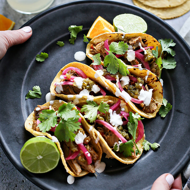 photo of a plate with shredded pork tacos