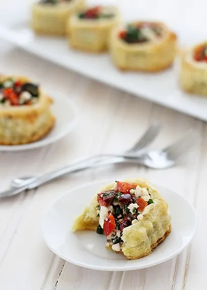 Greek puff pastry appetizer on white plate