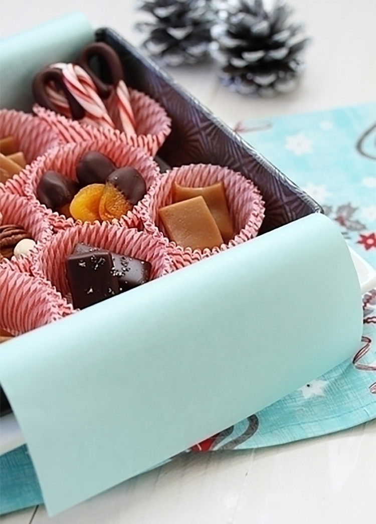 photo of dark chocolate salted caramels and homemade sea salt caramels in a holiday gift box