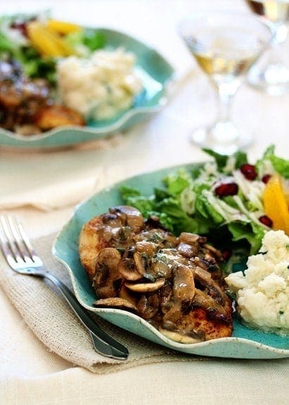 photo of chicken marsala with creamy mushroom marsala sauce on a plate