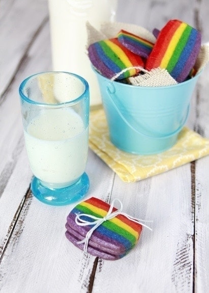 photo of rainbow slice and bake cookies with a glass of milk