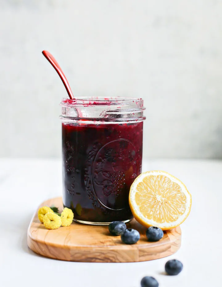 photo of a jar of blueberry sauce to go along with a tutorial on how to open a jar