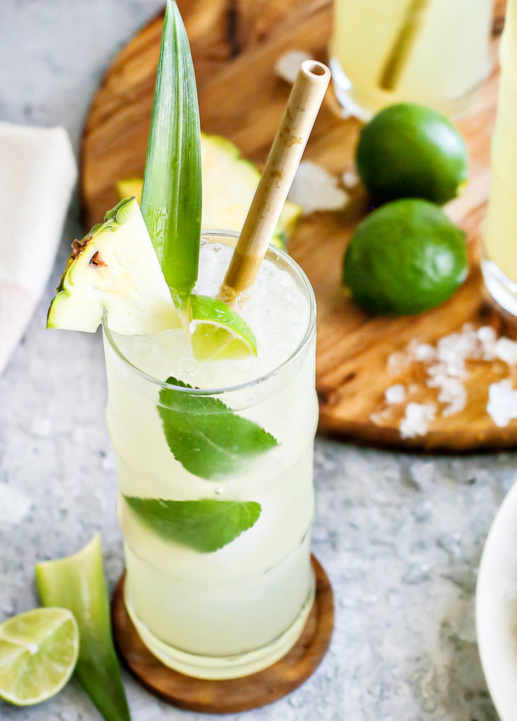 close up photo of a pineapple cooler in a glass