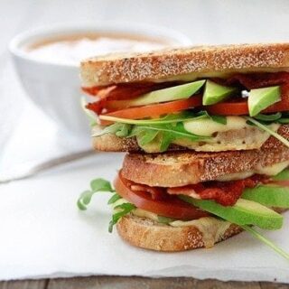 Grilled Cheese with Tomato, Avocado, Bacon, and Arugula