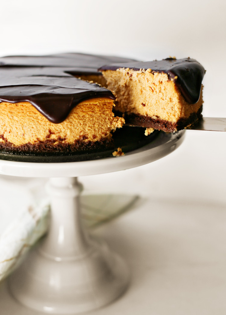 photo of a chocolate pumpkin cheesecake being sliced