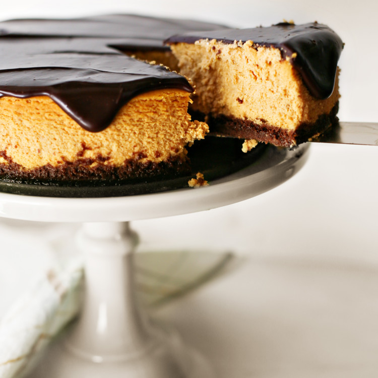 photo of a chocolate pumpkin cheesecake being sliced