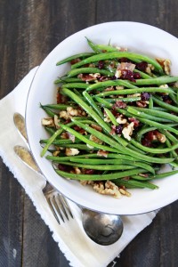 sauteed garlic and bacon green bean recipe with cranberries and walnuts
