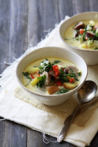 Italian Sausage Kale Soup in two white bowls