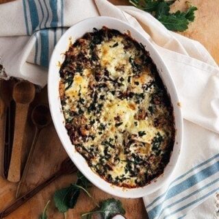 baked eggs with sausage and kale