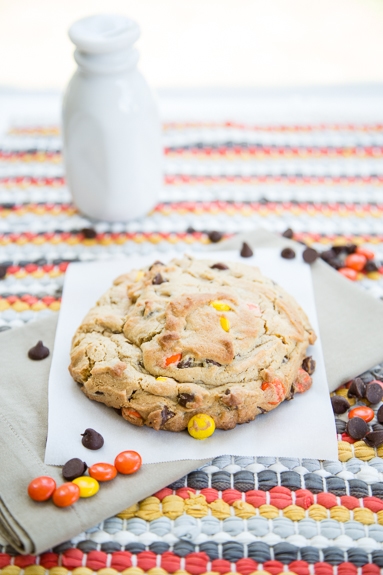 single serve cookie studded with reese's pieces and chocolate chips