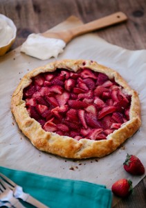 strawberry galette on a wooden table