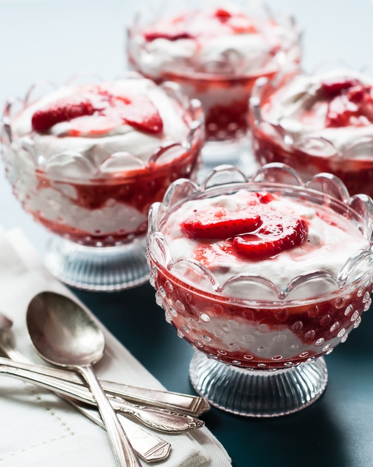 a photo of a strawberries and cream recipe called Strawberry Fool Dessert in clear dessert dishes