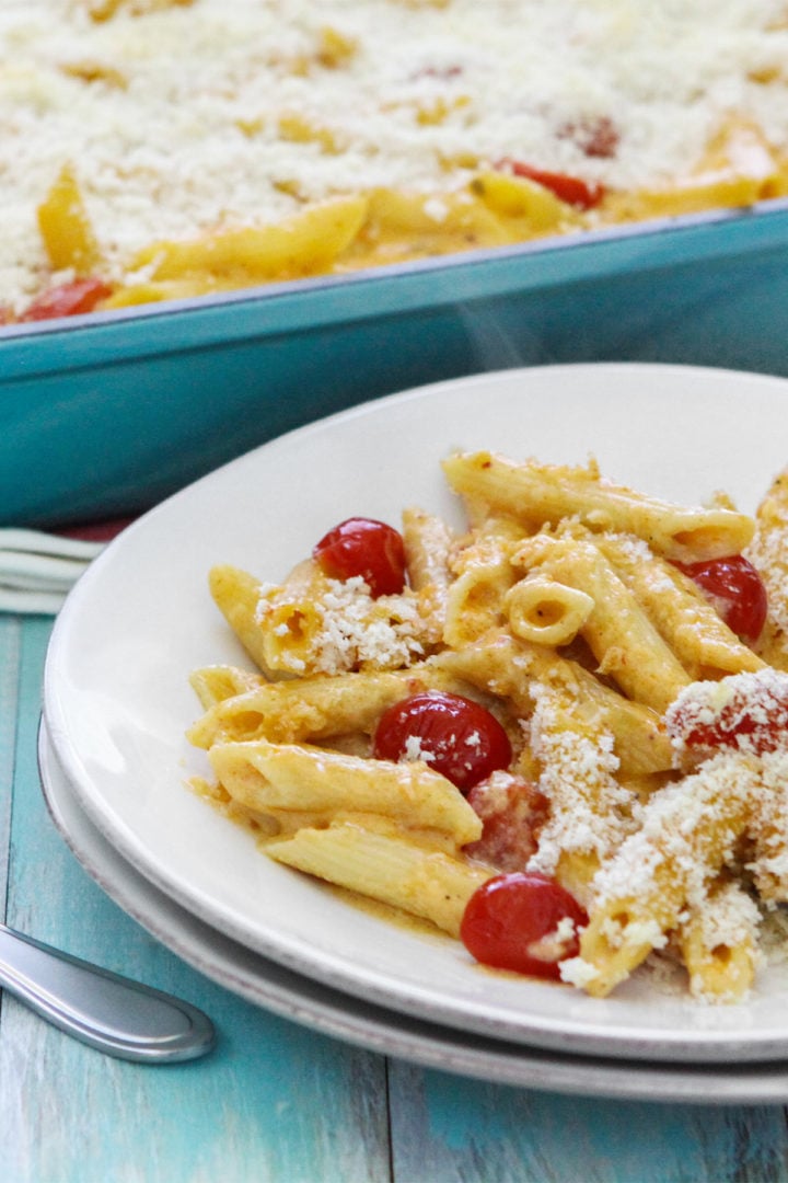 a plate of Southwest Mac and Cheese in front of a casserole dish