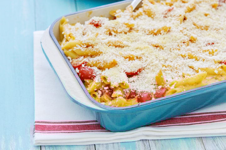 baked Southwestern macaroni and cheese in a blue casserole dish