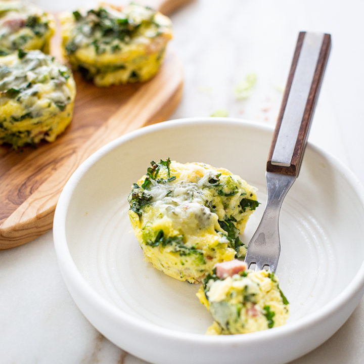 mini broccoli ham quiches on a plate