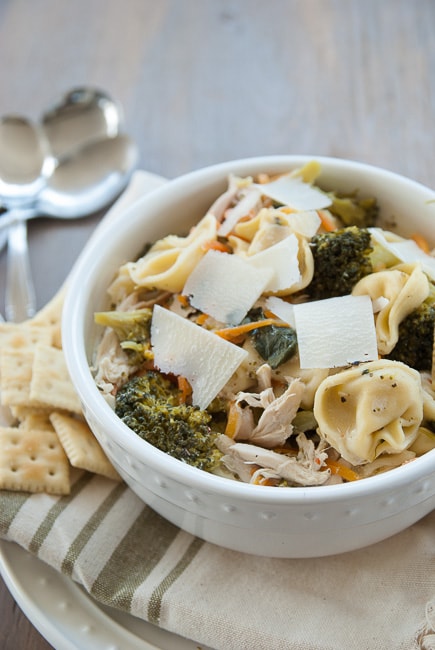 photo of a bowl of tortellini soup with chicken