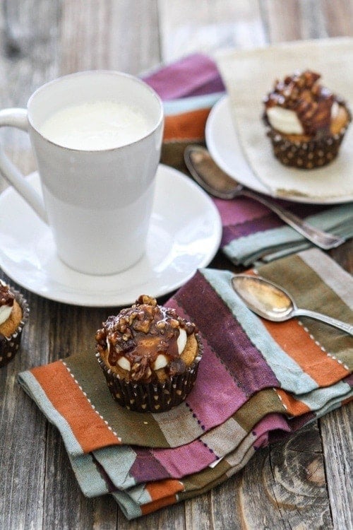 pumpkin cupcakes with cream cheese frosting and caramel pecan glaze