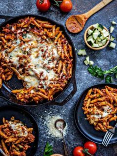 Easy One Skillet Baked Ziti is the perfect, easy comforting pasta dish. Baked Ziti made in a single skillet for a quick weeknight meal.