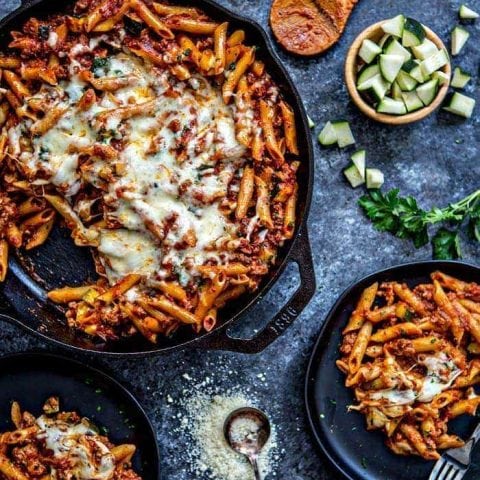 Easy One Skillet Baked Ziti is the perfect, easy comforting pasta dish. Baked Ziti made in a single skillet for a quick weeknight meal.