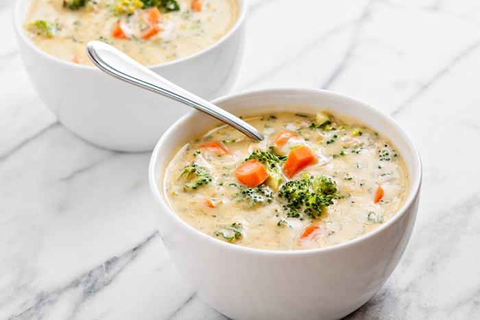 easy cheesy broccoli, kale, carrot soup recipe for national soup month