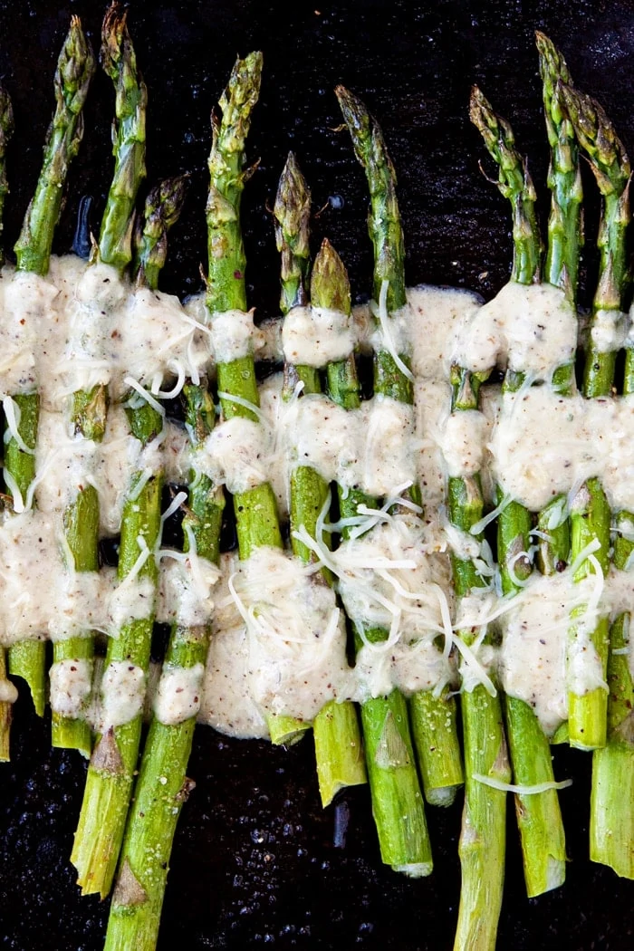 oven roasted asparagus drizzled with lemon dressing 