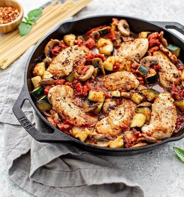 cats iron skillet with italian chicken and tomatoes