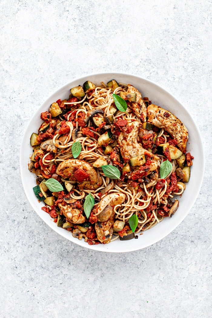 large white bowl with chicken and pasta