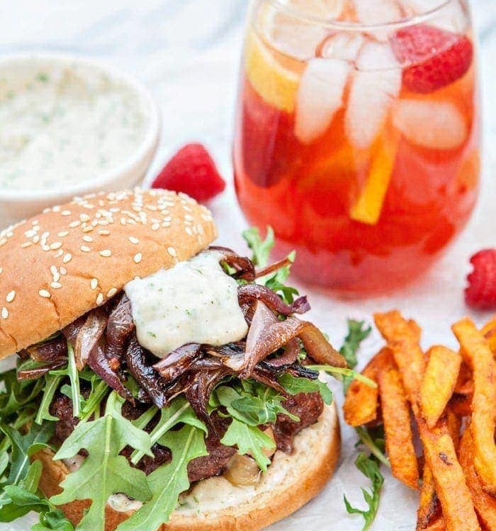 Gouda Stuffed Burgers with Horseradish Aioli and Caramelized Onions