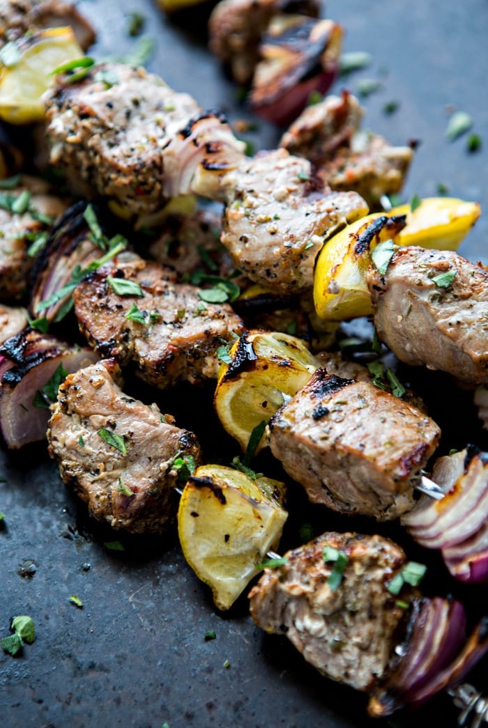 Fresh summer meals and outdoor entertaining are where it is at when it comes to this Greek Pork Kebab Platter with Greek Pico de Gallo. Juicy chunks of pork tenderloin are grilled with onion, lemon, and oregano and served platter style with Greek Pico de Gallo.