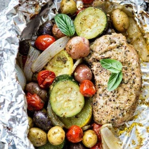 Pesto Pork Chop and Summer Vegetable Foil Dinners