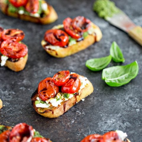 Roasted Tomato Crostini with Walnut Almond Pesto and Goat Cheese