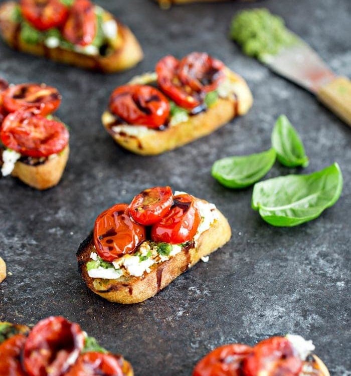 Roasted Tomato Crostini with Walnut Almond Pesto and Goat Cheese