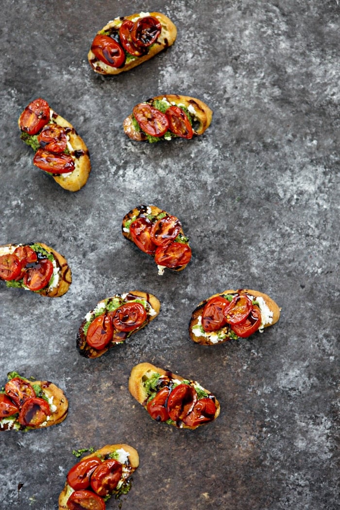 Roasted Tomato Crostini with Walnut Almond Pesto and Goat Cheese appetizer for summer photo and recipe