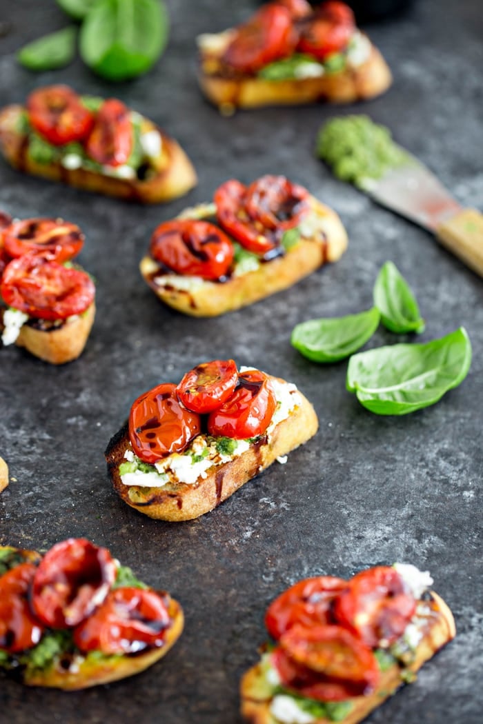 Roasted Tomato Crostini with Walnut Almond Pesto and Goat Cheese