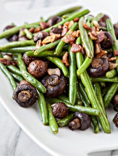 Garlic Bacon Sautéed Green Beans with Roasted Mushrooms make a great Thanksgiving side dish, loaded with flavor, and a lot more fresh tasting than the traditional green bean casserole.