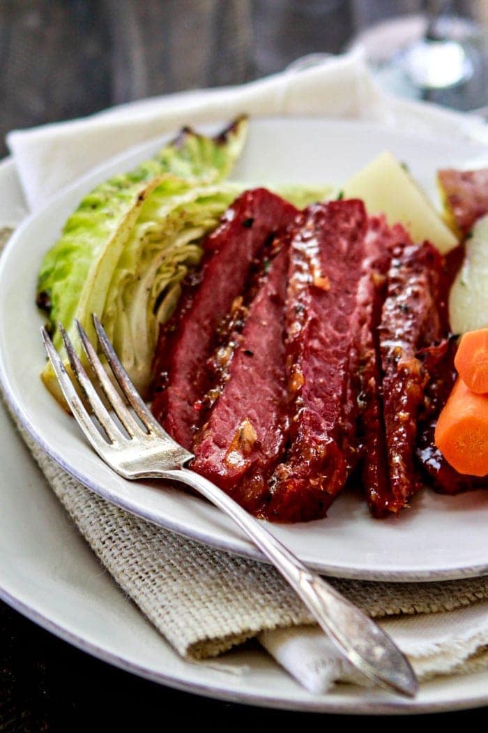 This Honey Marmalade Mustard Glazed Corned Beef is a fun take on the traditional St. Patrick's Day meal. Rather than stewing in the crock pot all day, the Corned Beef is braised with plenty of seasonings before broiling in the oven with a delicious Honey Marmalade Mustard Glaze.