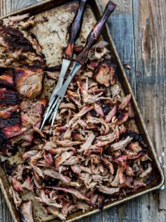 overhead shot of baking sheet with shredded pulled pork