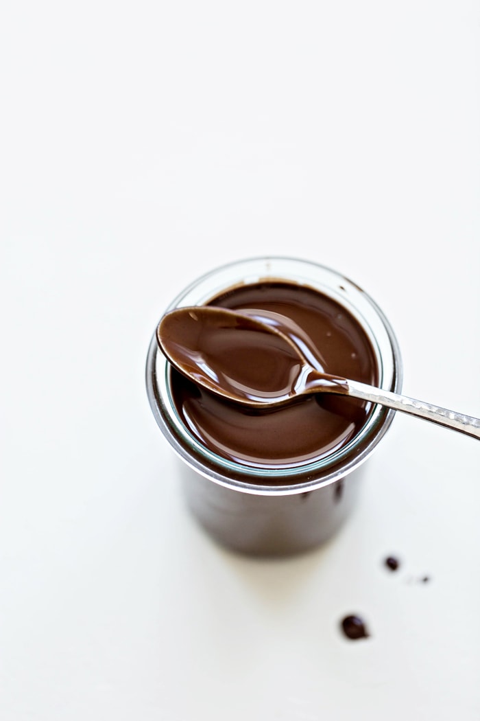 picture of homemade magic shell in a jar with spoon