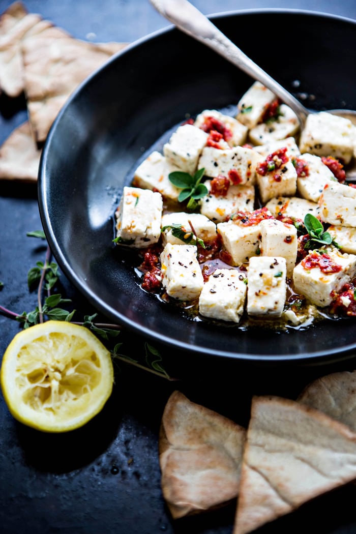 black bowl with feta and lemon