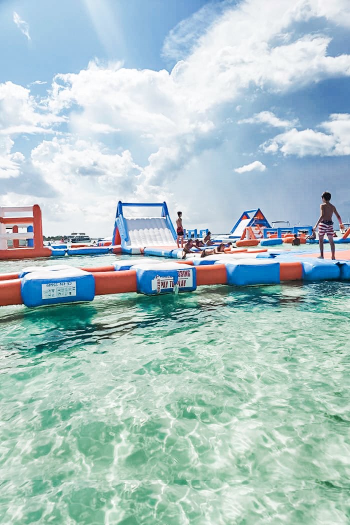 photo of inflatable water park and inflatable slides in crab island the emerald coast of destin florida