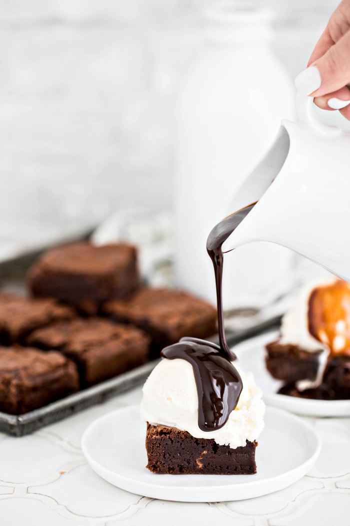 homemade brownies with ice cream and hot fudge