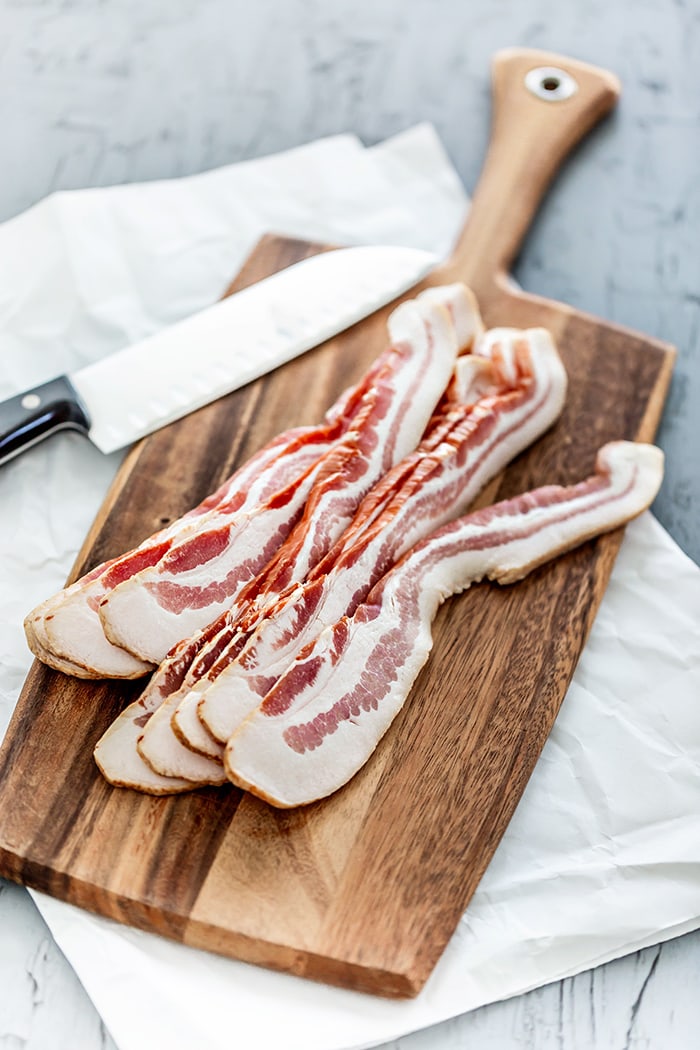 bacon slices on a cutting board