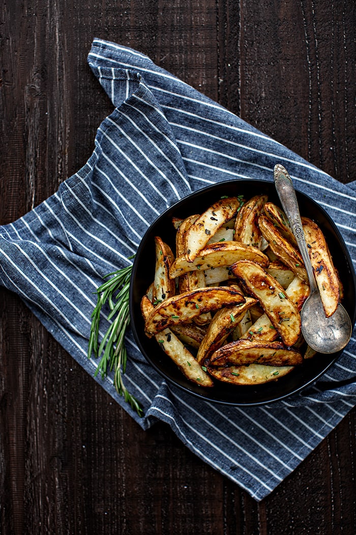 overhead photo of roasted potatoes in a bowl