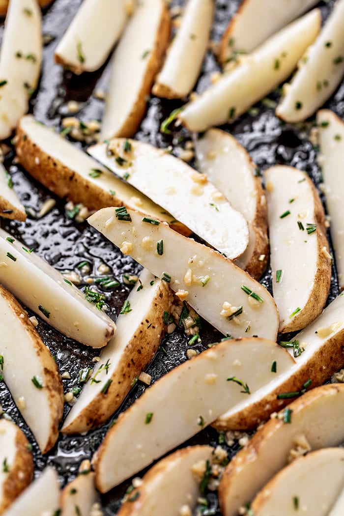 potato wedges on baking sheet