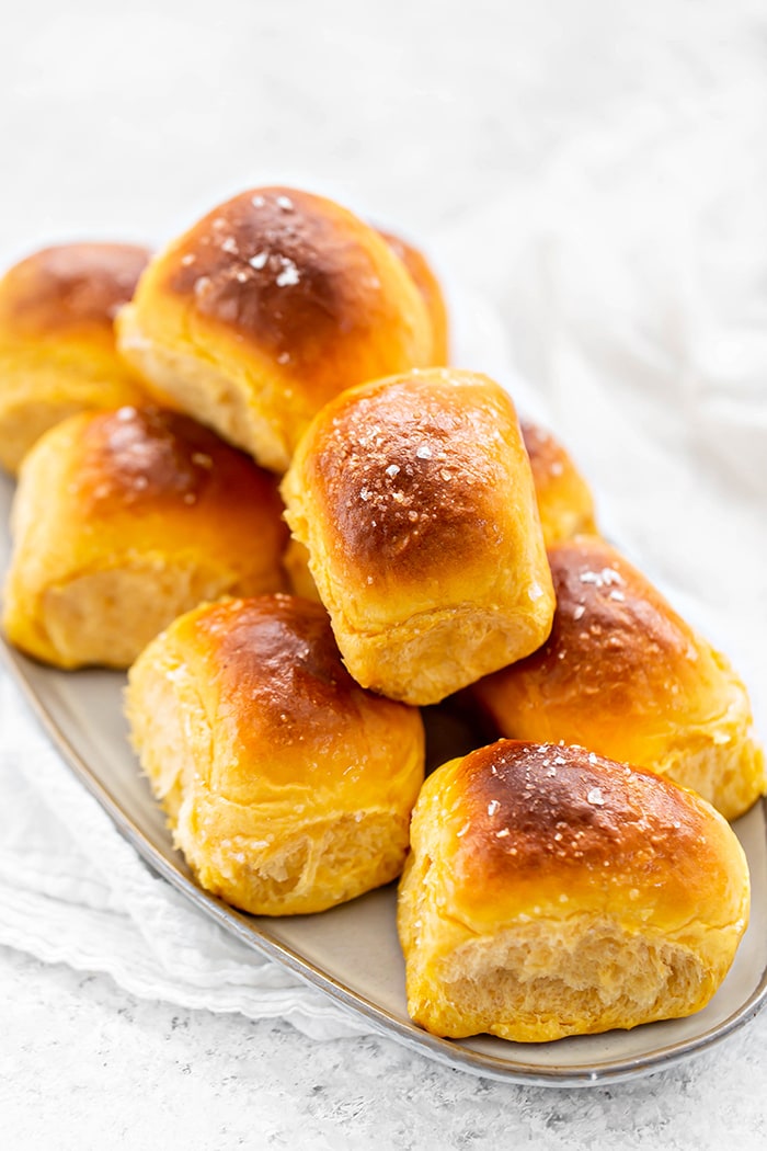 sweet potato dinner rolls on a plate