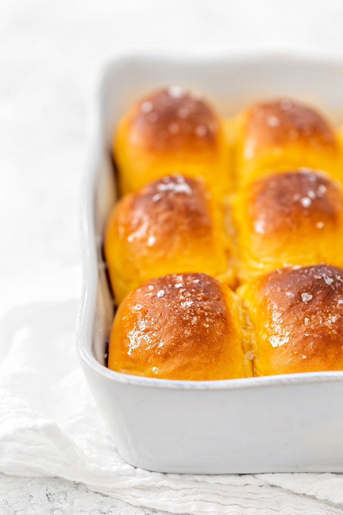 sweet potato rolls in a white baking dish