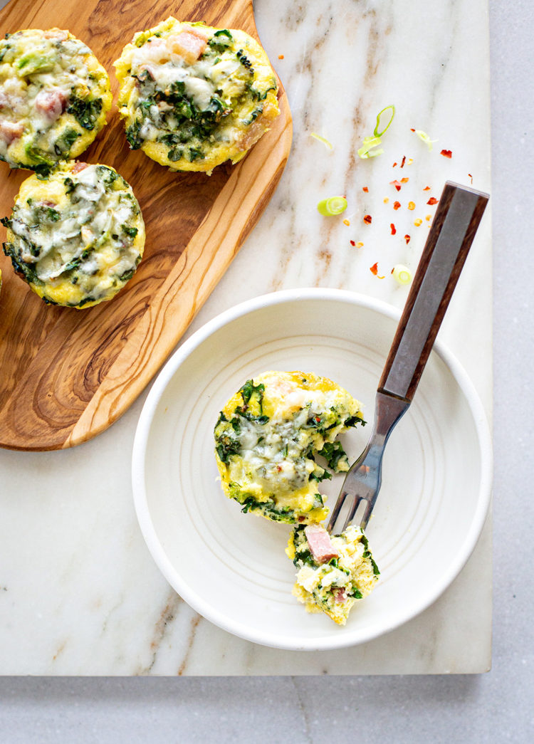mini broccoli ham quiches on a plate